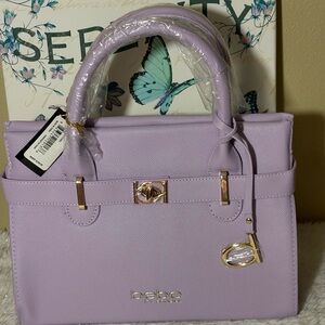 Bebe “Evie” Satchel Bag in Lilac/Lavender